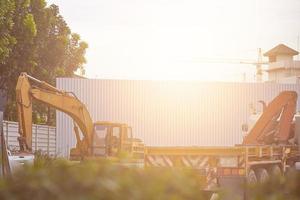 Construction or underconstruction site with Mako truck and traylor car photo