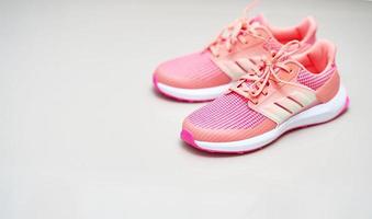 pink sport shoes on top view ,on  floor photo