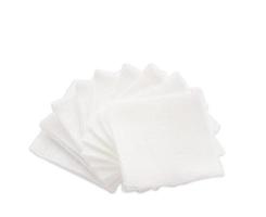 Pile of pad gauzes on isolated white background.jpg photo