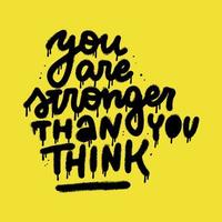 You are stronger than you think - Handwritten Urban Graffiti quote. Rough textured lettering text with drops and splashes. Hand drawn vector typographic illustration on yellow background.