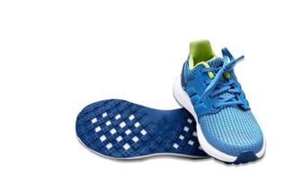 blue  sport shoes with shoes sole base on white isolated background