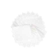 Pile of pad gauzes on isolated white background.jpg photo
