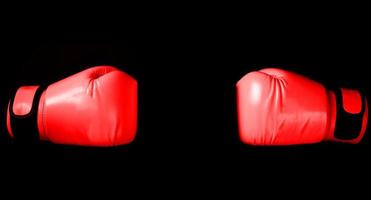 Blue Boxing glove in punching  in black background with copy space photo