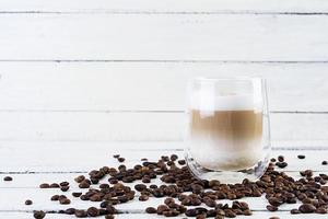 Cup of coffee macchiato. Hot drink coffee on white background photo