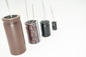 Isolated group of capacitor, used in electronic device. Electronic parts concept. photo