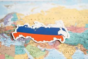 Bangkok, Thailand - February 1, 2022 Russia flag on world map background. photo