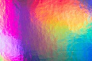 An iridescent holographic foil background photo