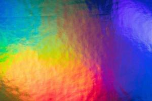 An iridescent holographic foil background photo