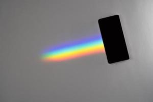 A Blank phone with a rainbow trail photo