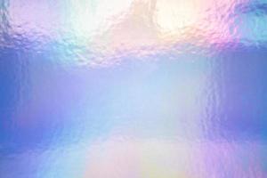 An iridescent holographic foil background pastel colors photo