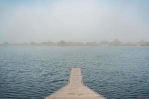 Pier on a lake photo