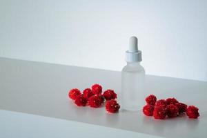 Face serum with red globe amaranths photo