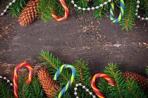 Christmas candy on a wooden background photo