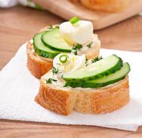 sandwiches with boiled egg and cucumber photo