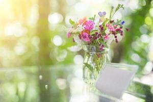 Good morning with bouquet of flowers on table photo