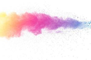 Multi color powder explosion on white background. photo