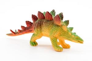 Stegosaurus toy model on white background photo