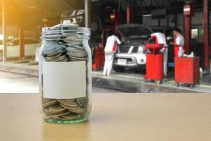 Money saving for Car payment in the glass bottle photo