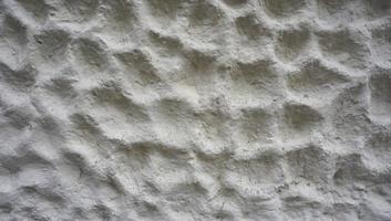 bubble texture on white cement wall finishing horizontal photo