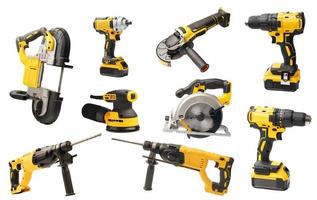 Electric tool set cordless rechargeable screwdrivers , Angle Grinder,circular saws ,cordless band saws on white background photo