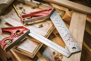 Combination Square ,Stainless steel ruler with Precision Level on table,woodworking concept.selective focus photo