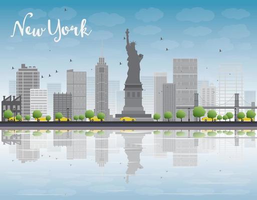 New York city skyline with grey building and blue sky.