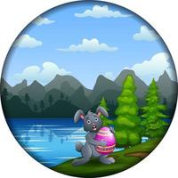 Cute a bunny holding Easter egg in a round frame vector