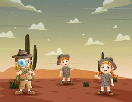 la niña y el niño exploradores en la ilustración del desierto vector