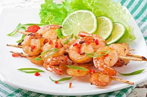 Shrimp sauteed in garlic and soy caramel photo