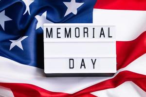 USA Memorial Day concept. American flag and text on white background. Celebration of national holiday. photo