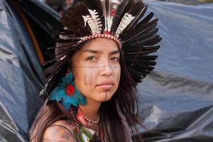 Brasilia, DF, Brazil-April 12, 2022 Thousands of Indigenous natives from all over Brazil descend upon Brasilia, for the annual Free Land Encampment or Acampamento Terra Livre. photo