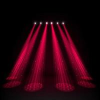 Red spotlights on dark background vector