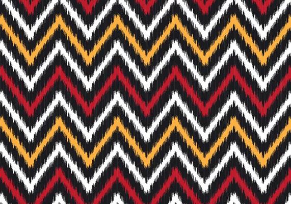 Modern ikat zig zag or chevron geometric shape with red, yellow seamless pattern background. Use for fabric, textile, decoration elements.