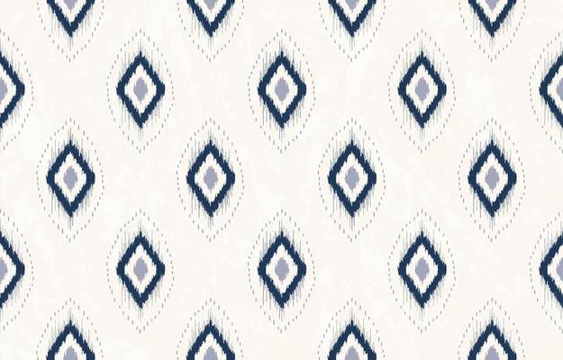 Ikat geometric blue diamond shape seamless pattern on white cream texture background. Use for fabric, textile, decoration elements.