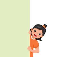 Cute little girl standing behind blank board peeking and pointing to empty banner with finger vector