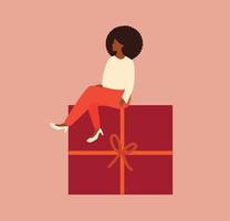 joven afroamericana se sienta en un gran regalo. concepto festivo para el día de la mujer, el día de la madre o las vacaciones con una mujer feliz sentada en una caja roja con cinta. ilustración vectorial vector