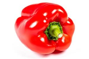 Ripe red bell peppers on white background photo
