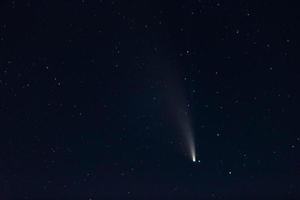Real photo comet Neowise in the night sky with stars