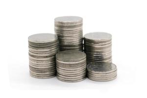 coins stacked on white background photo