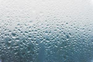 water drops on window glass photo