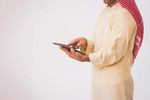 Arab businessman useing on a mobile phone photo