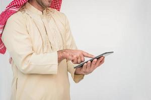 Arab businessman useing on a mobile phone photo