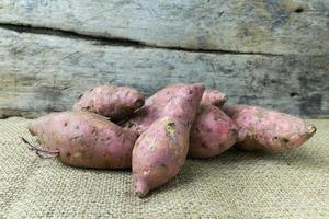 yam on wooden table photo