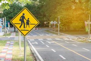 Students crossing ahead sign photo