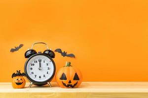 Halloween Pumpkins on wooden table photo