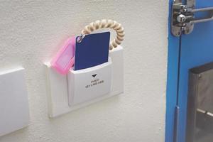 card for door access control scanning key card to lock and unlock door. photo