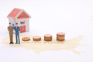 Businessman and house on map American. Miniature people photo