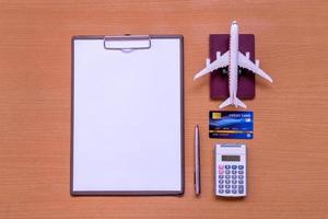 White paper travel form with model and policy document photo