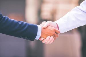 Businessmen making handshake. concept Successful businessmen photo