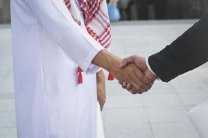 Arab businessmen worker handshaking on construction site photo